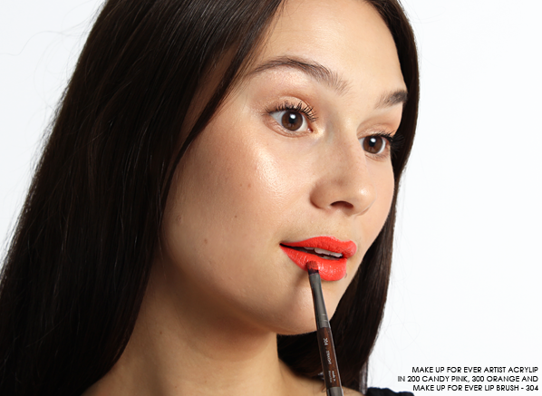 MAKE UP FOR EVER Artist Acrylip 200 Candy Prink and MAKE UP FOR EVER Artist Acrylip 300 Orange applied to lips